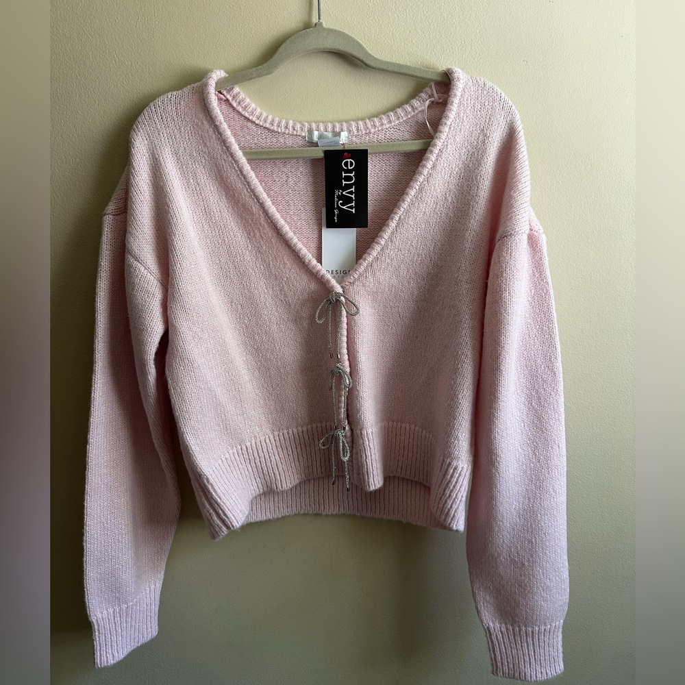 Design History pink knit sweater with bows